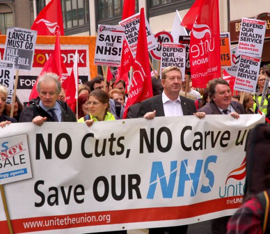Trade unionists and youth marching to defend the NHS last July – now all unions are agreed that the health bill must be stopped