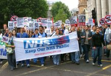 Hospital workers marching last May against the sell-off of NHS services