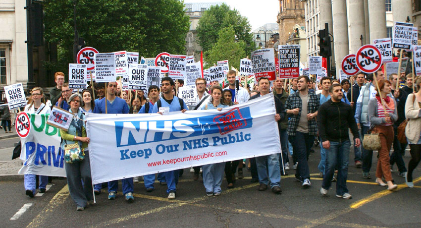 Hospital workers marching last May against the sell-off of NHS services
