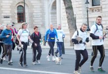 Royal College of GPs Chair CLARE GERADA (centre in black with dog) arriving last month in Whitehall with the ‘Bevan’s Run’ consultants opposed to the Health Bill