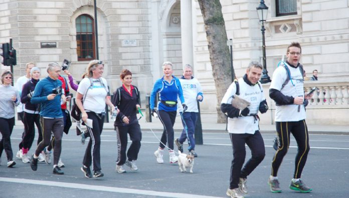 Royal College of GPs Chair CLARE GERADA (centre in black with dog) arriving last month in Whitehall with the ‘Bevan’s Run’ consultants opposed to the Health Bill
