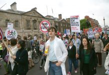 Health workers marching in London in defence of the NHS last May