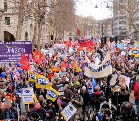 Local government workers marching in London during their strike action last November 30