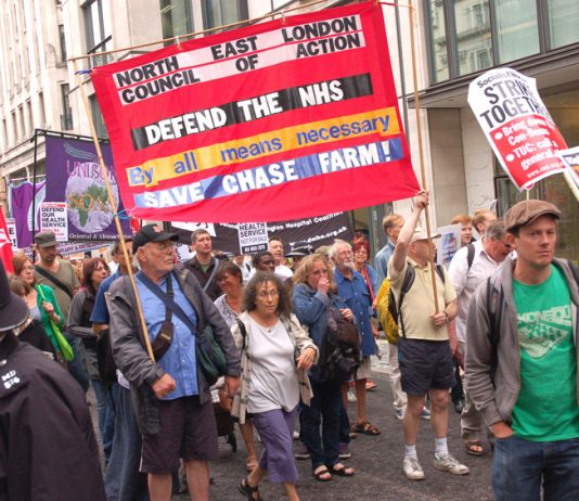 The North East London Council of Action banner on the Unite march to defend the NHS last July. Now the whole movement has taken up this demand