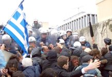 Greek workers battle with riot police