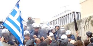 Greek workers battle with riot police