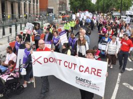 Carers marching against wage and services cuts last year