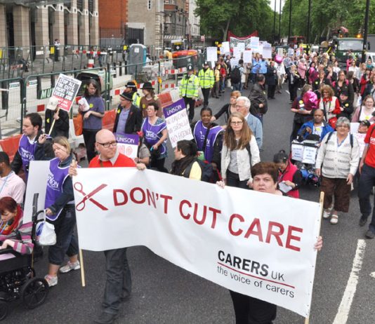 Carers marching against wage and services cuts last year