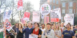 Part of the demonstration outside the Houses of Parliament yesterday afternoon condemning the Cameron-Clegg coalition and its budget