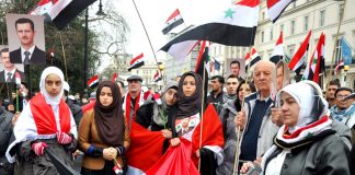 Rally outside the Syrian embassy in London on March 17 commemorates the 27 killed in Damascus that morning by two car bombs