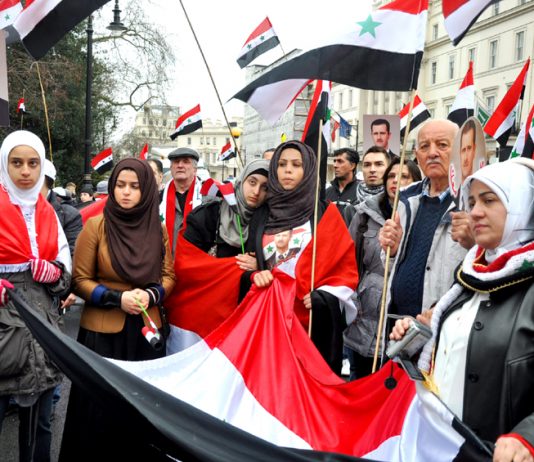 Rally outside the Syrian embassy in London on March 17 commemorates the 27 killed in Damascus that morning by two car bombs
