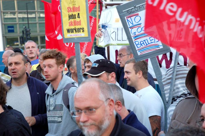 Sparks demonstrating against 30 per cent wage cuts outside the Kings Cross construction site last September