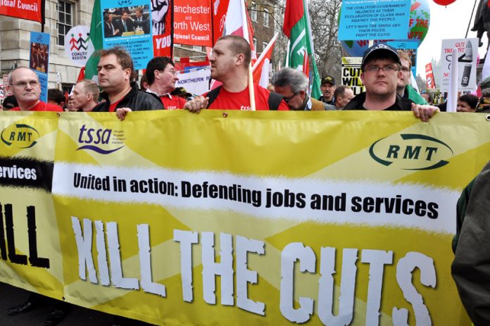 Rail workers on the TUC demonstration against the coalition’s cuts on March 26 last year