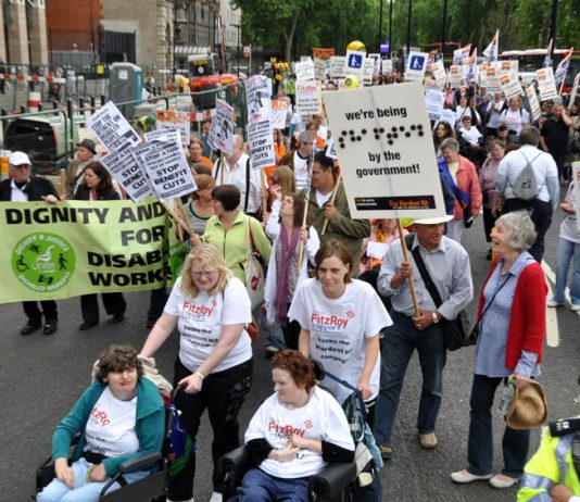 Disabled people march against cuts to the Disability Living Allowance