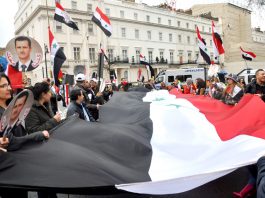 Syrians in London defending their country against the onslaught by imperialism