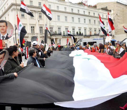 Syrians in London defending their country against the onslaught by imperialism
