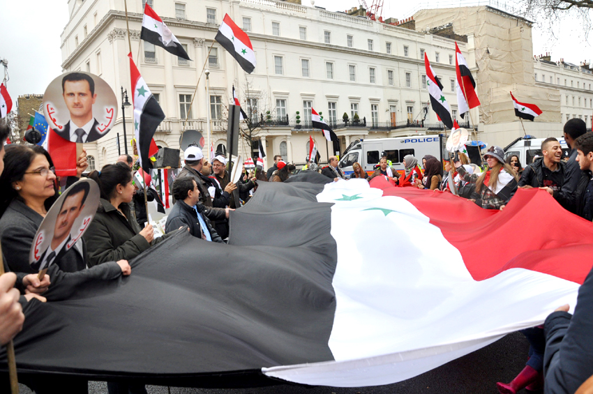 Syrians in London defending their country against the onslaught by imperialism
