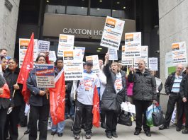 Remploy workers demonstrate outside the Department of Work and Pensions in central London yesterday demanding that their factories be kept open