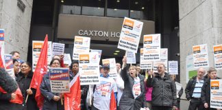 Remploy workers demonstrate outside the Department of Work and Pensions in central London yesterday demanding that their factories be kept open