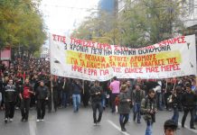 A large university students banner at the head of an anti-austerity demonstration in Athens