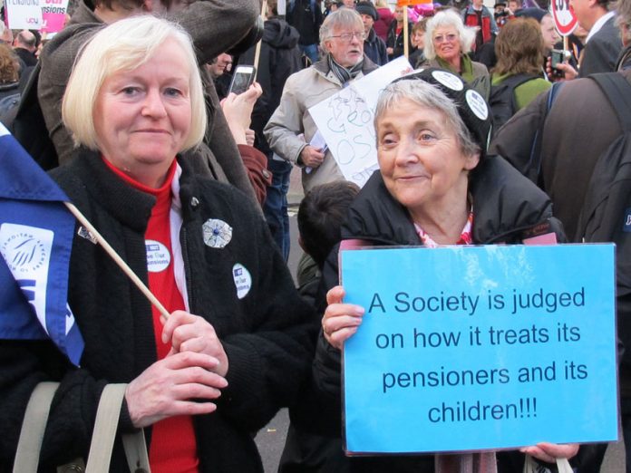 Marchers with a clear message on a demonstration during the pensions strike last November 30