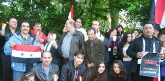A section of the 100-strong vigil outside the Syrian embassy on Friday evening in memory of the over 70 killed in the latest bombing in Damascus