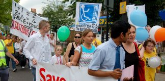 Special needs pupils and supporters march against the lack of places in state schools due to government cuts to resources