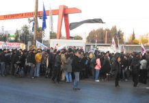 Illegally striking workers and their supporters outside the Hellenic Steel plant in Aspropyrgos near Athens