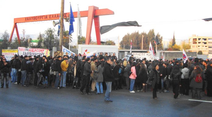 Illegally striking workers and their supporters outside the Hellenic Steel plant in Aspropyrgos near Athens