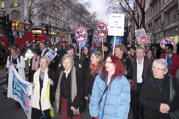 BMA members marching in central London against the Health Bill – the BMA has now demanded that Lansley resign