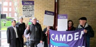 William Westwell (fourth from left, with witch-hunt placard) demonstrating outside the school before the first hearing