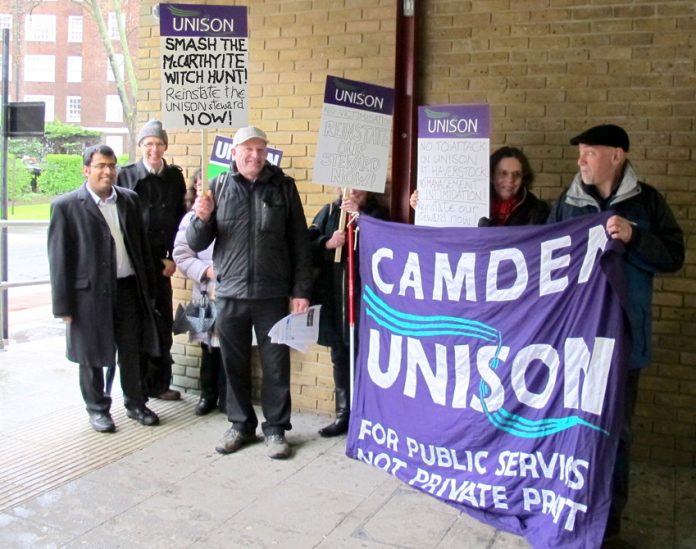 William Westwell (fourth from left, with witch-hunt placard) demonstrating outside the school before the first hearing