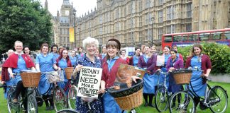 Royal College of Midwives president Lesley Page with midwifery students on vintage cycles yesterday demanding 5,000 more midwives