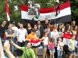 Syrians rally outside their embassy in London on Saturday to express their support for the Russian and Chinese use of their veto against the lastest US-UK resolution at the UN Security Council on Thursday