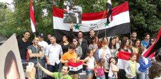 Syrians rally outside their embassy in London on Saturday to express their support for the Russian and Chinese use of their veto against the lastest US-UK resolution at the UN Security Council on Thursday