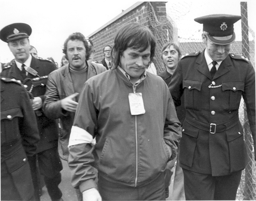 Police lead away Tony Merrick, one of the Pentonville 5, under arrest for picketing at the Midland Coal store in 1972. The dockers organised mass strike action and it took the threat of a general strike to gain their release