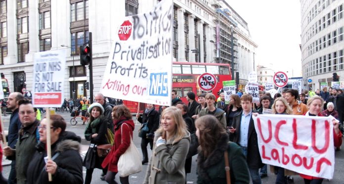 Demonstrators make clear their opposition to NHS privatisation on a march organised by the BMA earlier this year