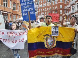 The Ecuadorian Community banner at their embassy. ‘We are not a British colony,’ chanted supporters