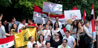 Syrian Youth in Britain demonstration outside their embassy in London on August 4th in support of President Assad and in  opposition to the US/UK-backed terror campaign in Syria