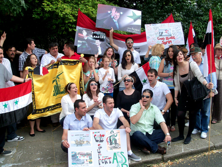 Syrian Youth in Britain demonstration outside their embassy in London on August 4th in support of President Assad and in  opposition to the US/UK-backed terror campaign in Syria