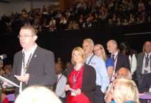 Delegates queue to ask Balls questions