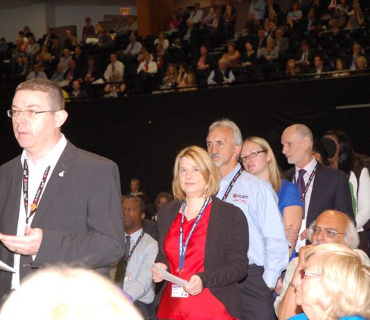 Delegates queue to ask Balls questions
