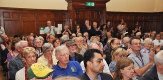 A section of a mass meeting in Ealing on 26 June to resist the closure of Southall’s main hospital which the area cannot do without