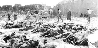 Piles of bodies of those killed by the Lebanese Christian Phalange militia under the direction of the