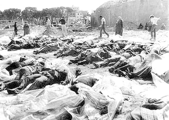 Piles of bodies of those killed by the Lebanese Christian Phalange militia under the direction of the