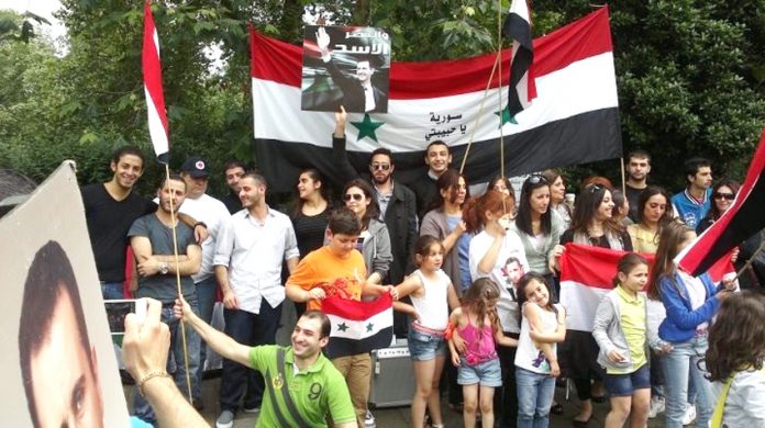 Syrian youth rally in London in support of President Assad and against imperialist intervention