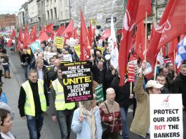 Workers marching in Dublin in defence of jobs