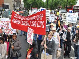 Marching in defence of disabled workers rights in May last year