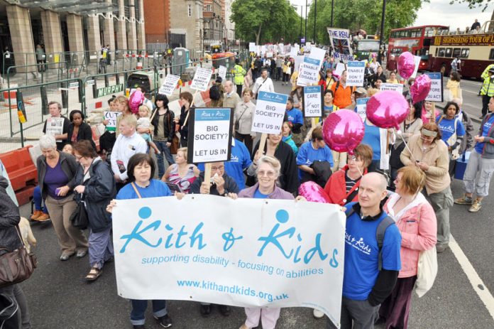 Thousands marched through London  in May 2011 against the cut in disability benefits