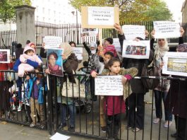 Women and children demonstrating outside Downing Street condemned the slaughter going on in Bani Walid